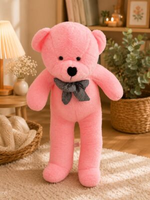 Koyu renkli papyonlu pembe peluş ayı